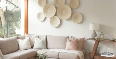 a living room filled with furniture and a large window