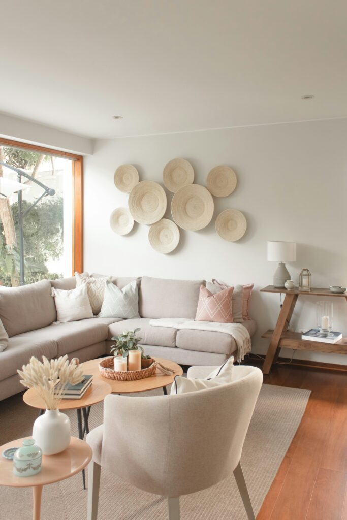 a living room filled with furniture and a large window